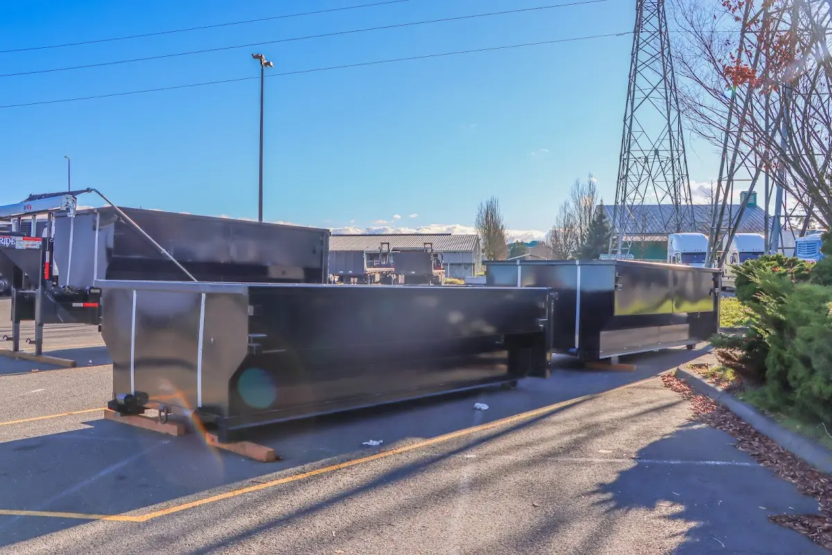 Roll-off dumpster ready for waste disposal at job site for Demolition Dumpster Rental in Macedon
